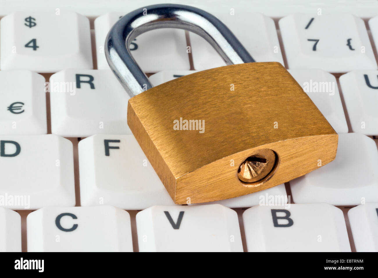padlock on a computer keyboard, data security and protection Stock Photo