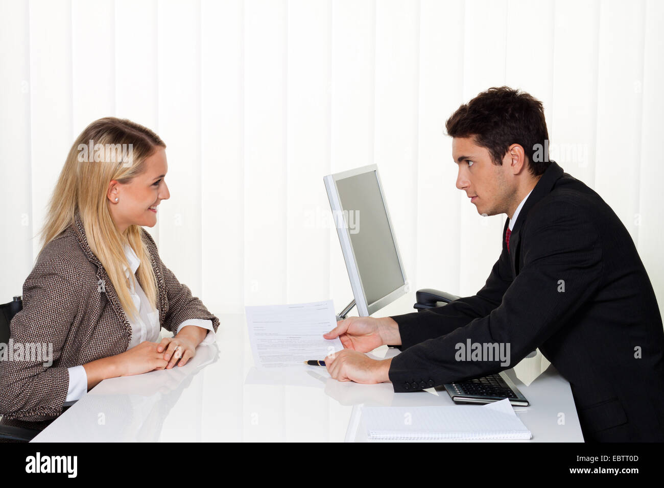 man an woman talking in an office Stock Photo - Alamy