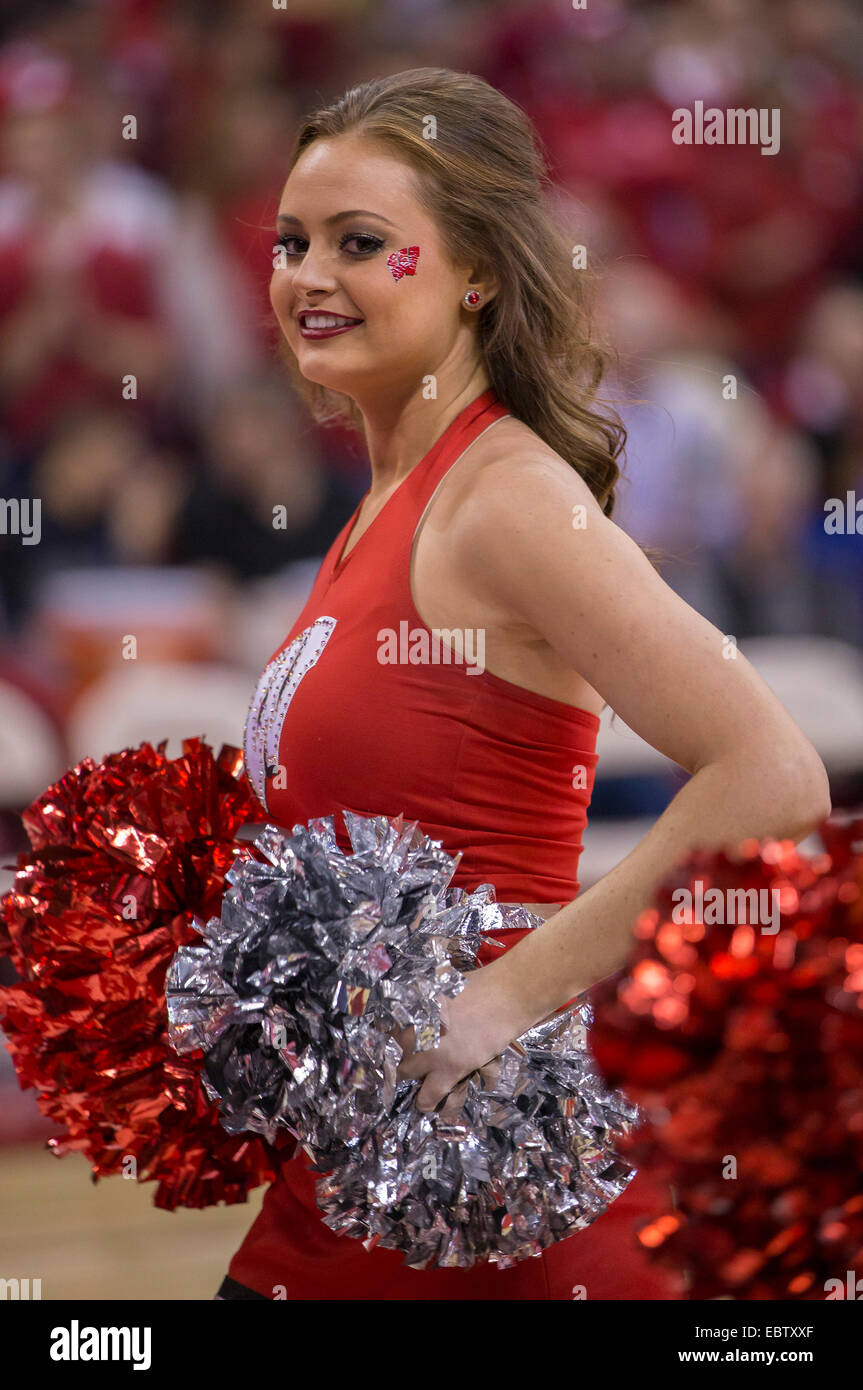 December 3, 2014: Wisconsin cheerleader entertains the crowd during the NCAA Basketball game between Duke Blue Devils and the Wisconsin Badgers at the Kohl Center in Madison, WI. Duke defeated Wisconsin 80-70. John Fisher/CSM. Stock Photo