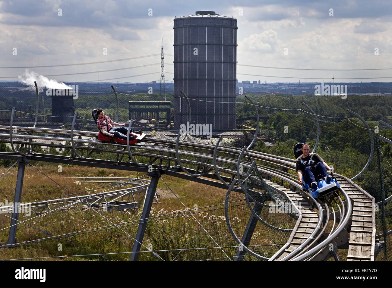 two person on a sommer chute of alpine centre on the area of coking plat Prosper, Germany, North Rhine-Westphalia, Ruhr Area, Bottrop Stock Photo