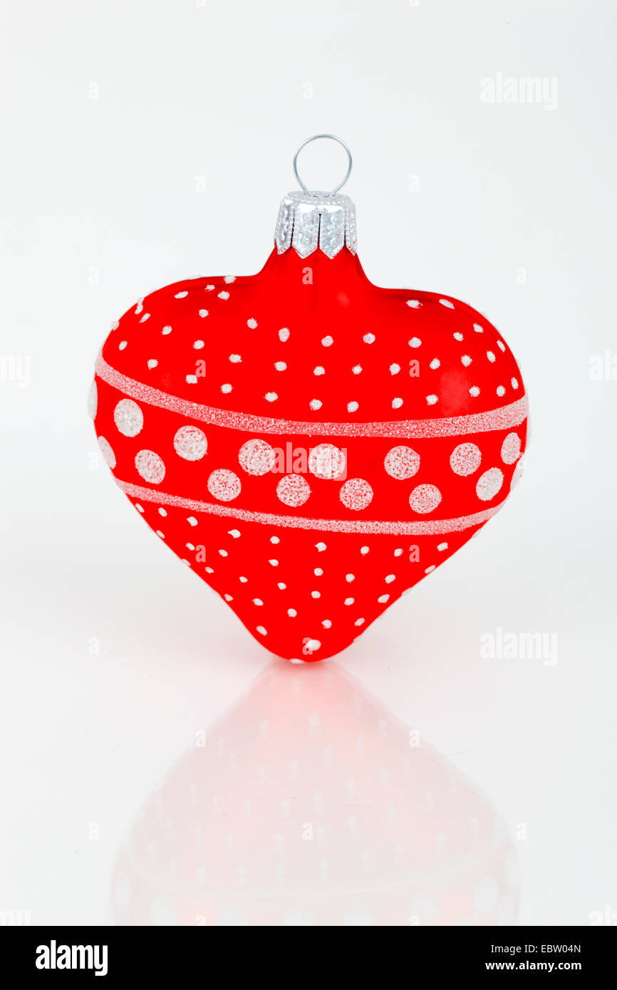 red heart-shaped Christmas tree ball Stock Photo