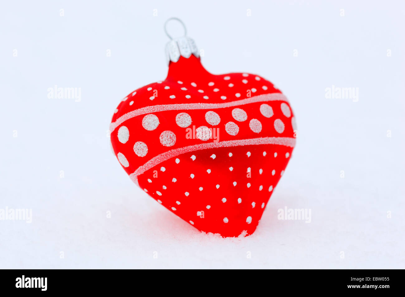 red heart-shaped Christmas tree ball Stock Photo