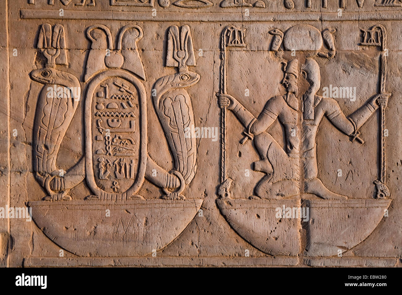 mural relief in the Temple of Kom Ombo for the falcon headed god Haroeris an the crocodile-god Sobek, Egypt, Kom Ombo Stock Photo