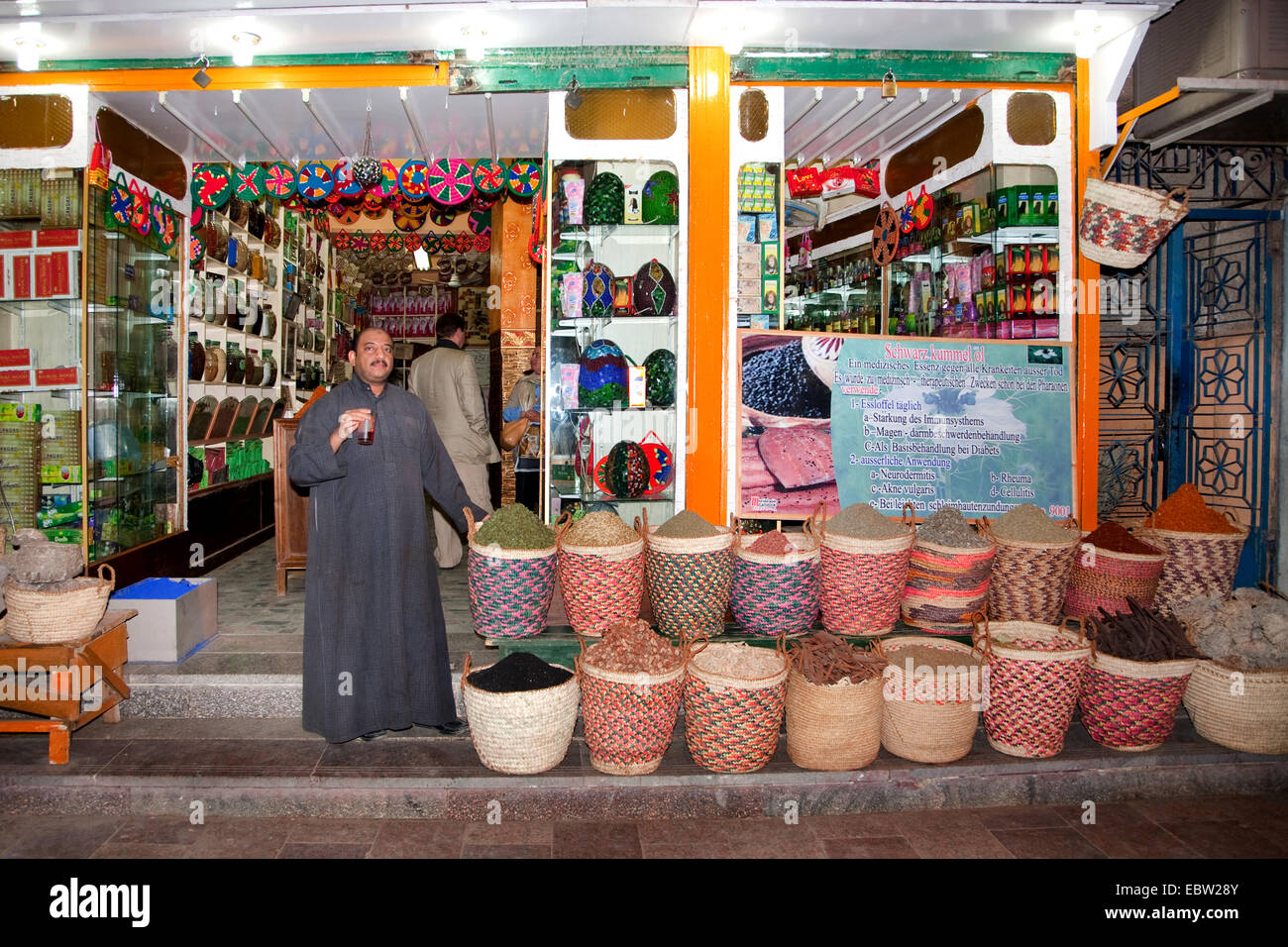 spice dealer standing in front of a store for a lot of spices, Egypt, Assuan Stock Photo Alamy