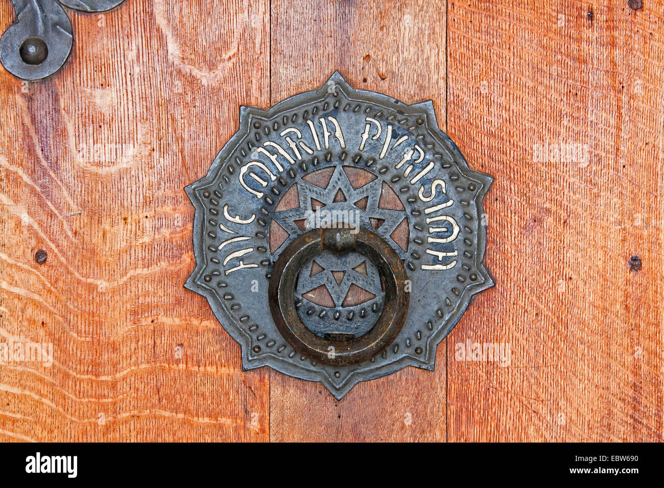 doorknocker at the door of Ave Maria Purisima monastery, Spain, Basque country, Navarra, Trinidad de Arre, Villava Stock Photo
