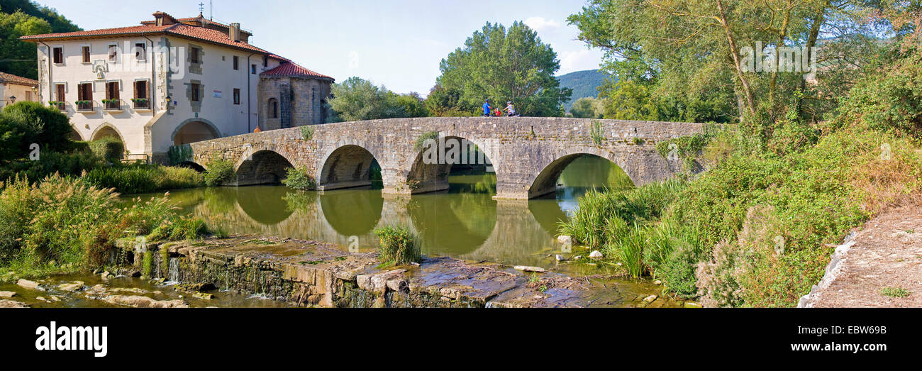 medieval bridge over Ri¡o Ulzama , Spain, Basque country, Navarra, Trinidad de Arre, bask. Villava Stock Photo