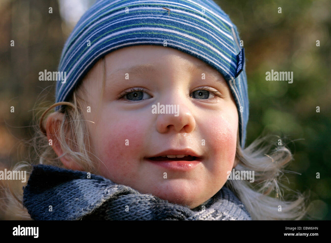 little boy smiling and looking at camera Stock Photo