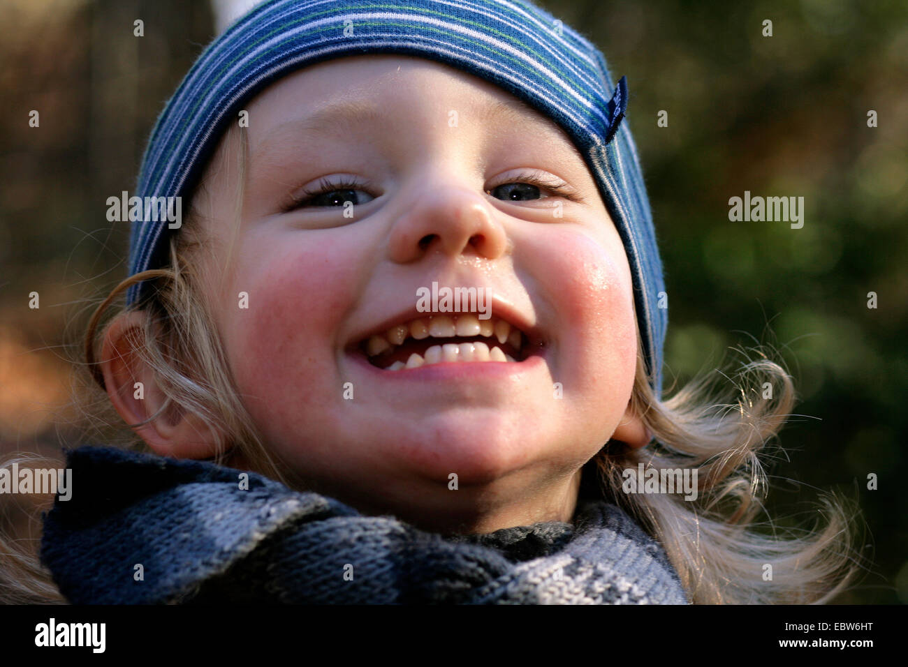 little boy laughing at camera Stock Photo