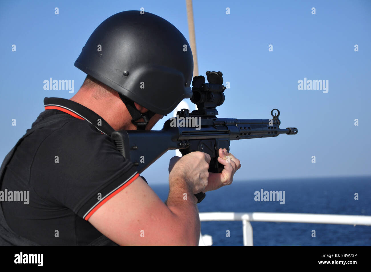 armed guard on board sea-going vessel in aden gulf Stock Photo
