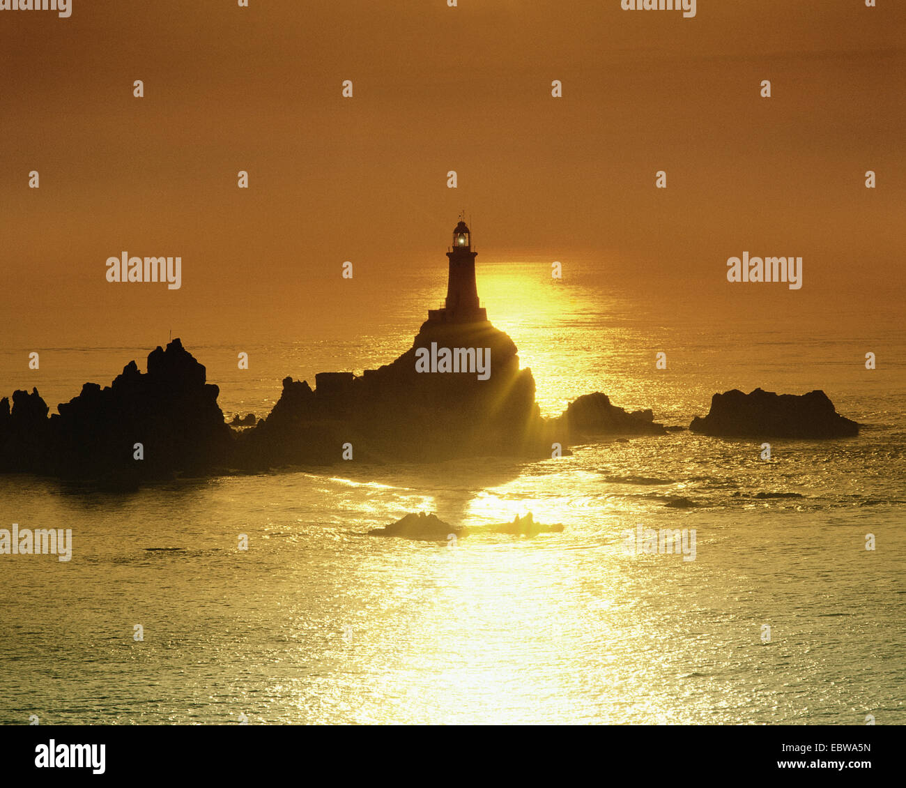 GB - JERSEY: La Corbiere Lighthouse at sunset Stock Photo