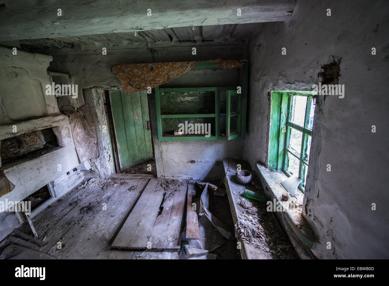 kitchen in old wooden cottage in abandoned Stechanka village, Chernobyl Exclusion Zone, Ukraine Stock Photo