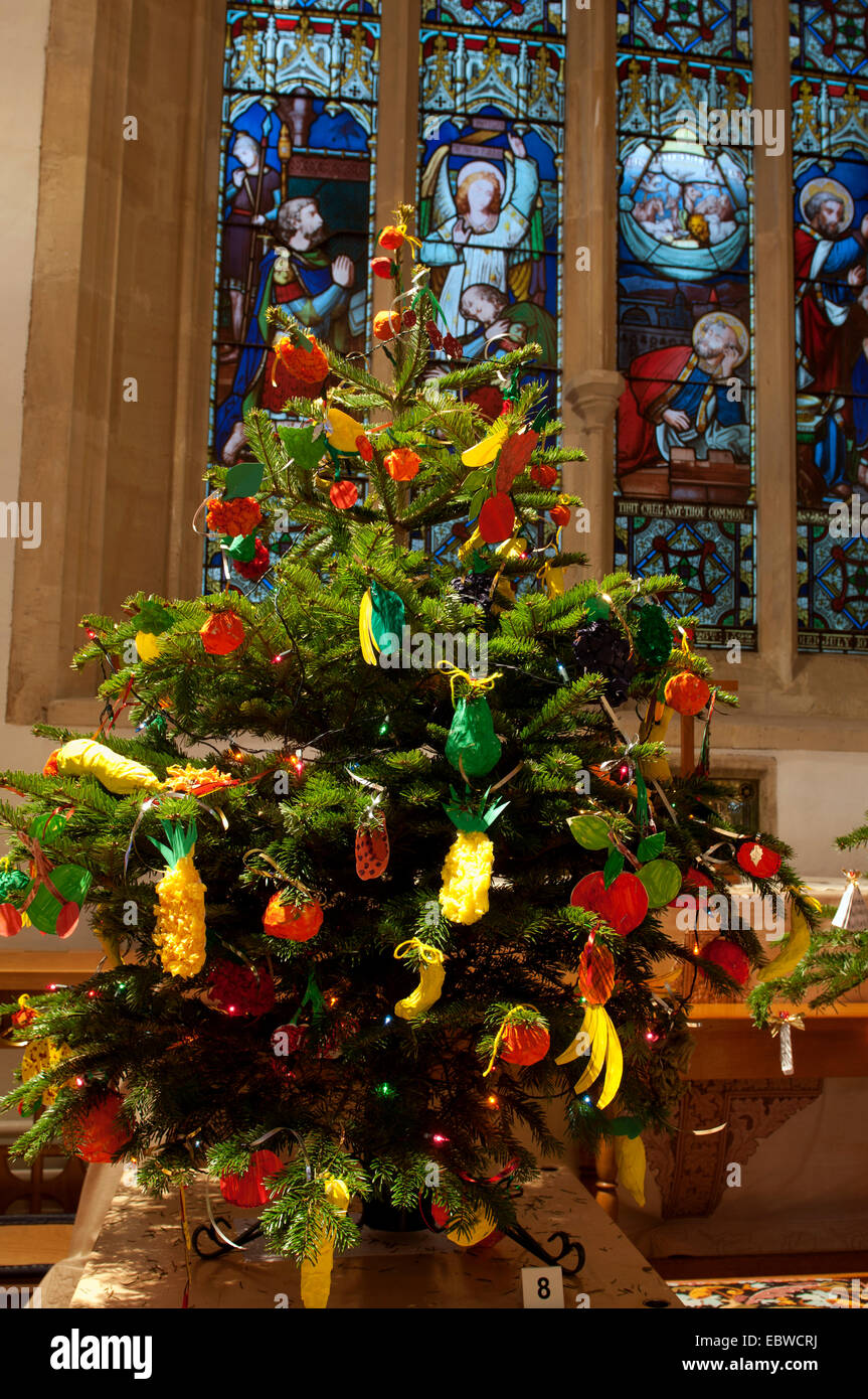 Christmas Tree Festival, St. Edward`s Church, Stow-on-the-Wold, Gloucestershire, UK Stock Photo 