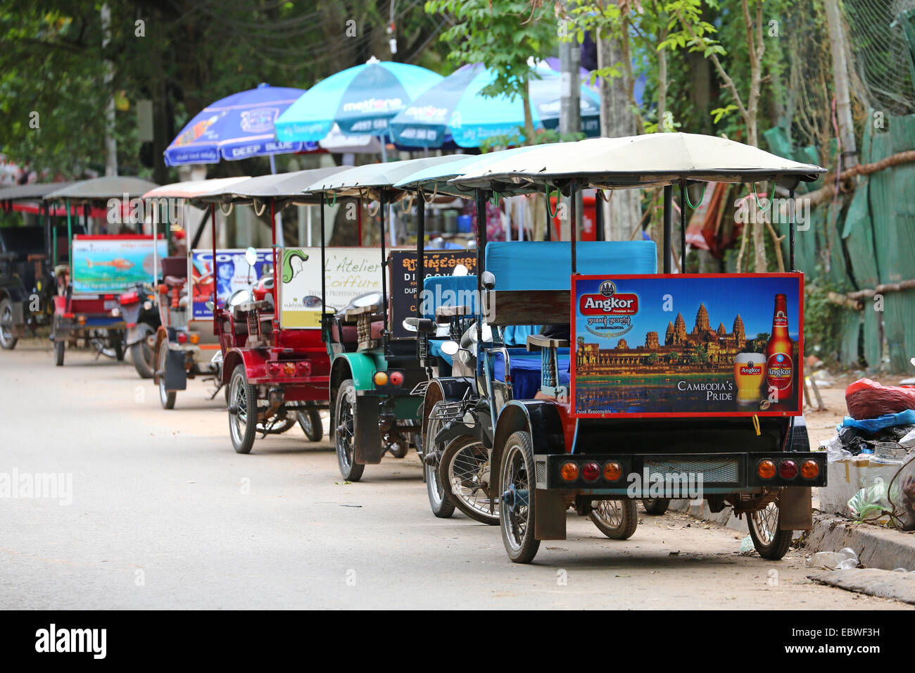 Street scene with Tuk Tuks, Siem Reap, Cambodia. Stock Photo
