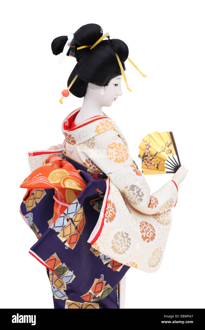 Traditional Japanese geisha doll isolated on white backgound Stock Photo