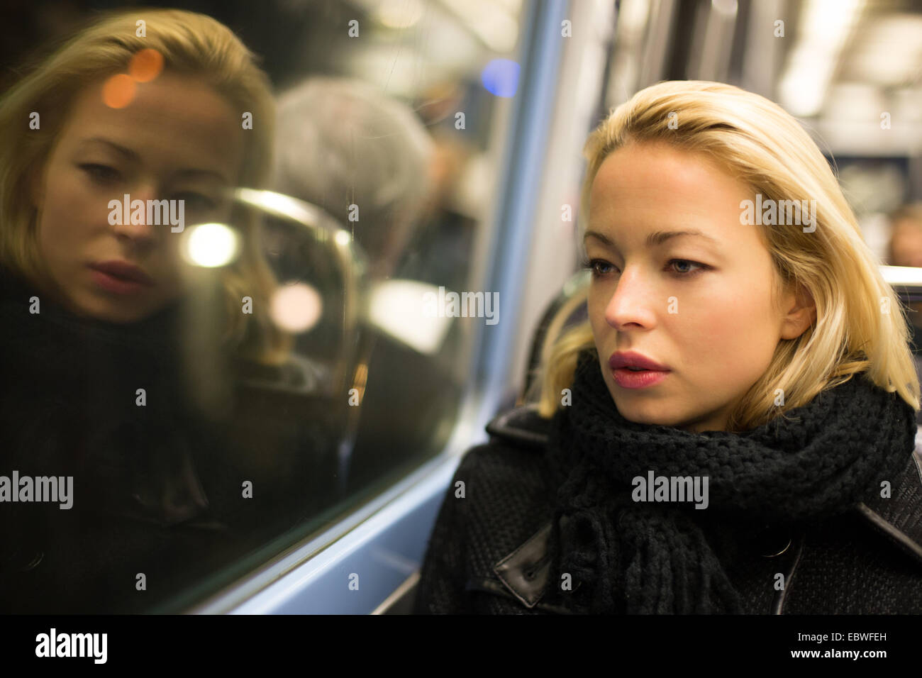 Woman looking out of window hi-res stock photography and images - Alamy