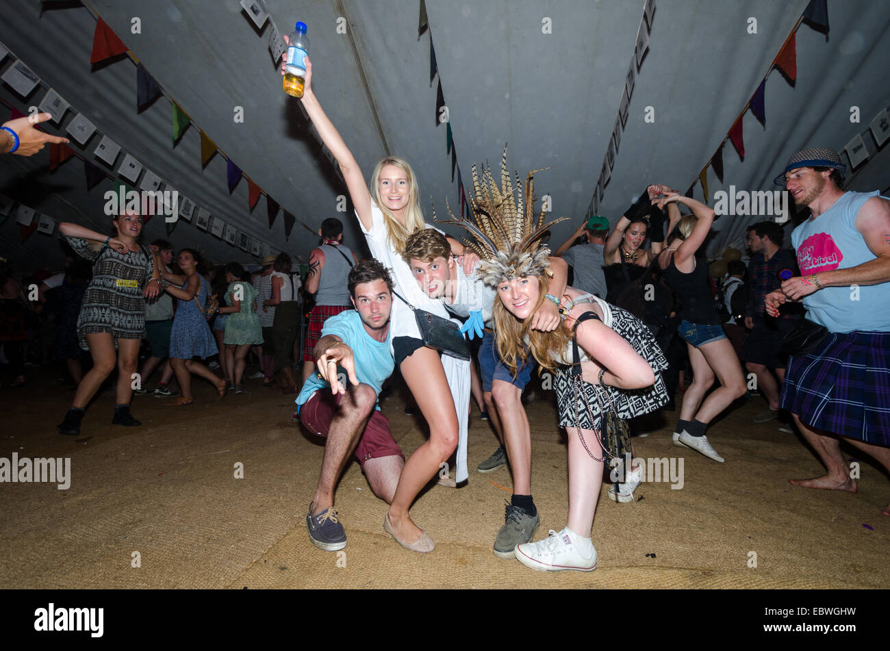 Young people posing for a photo at Secret Garden festival, United Kingdom Stock Photo