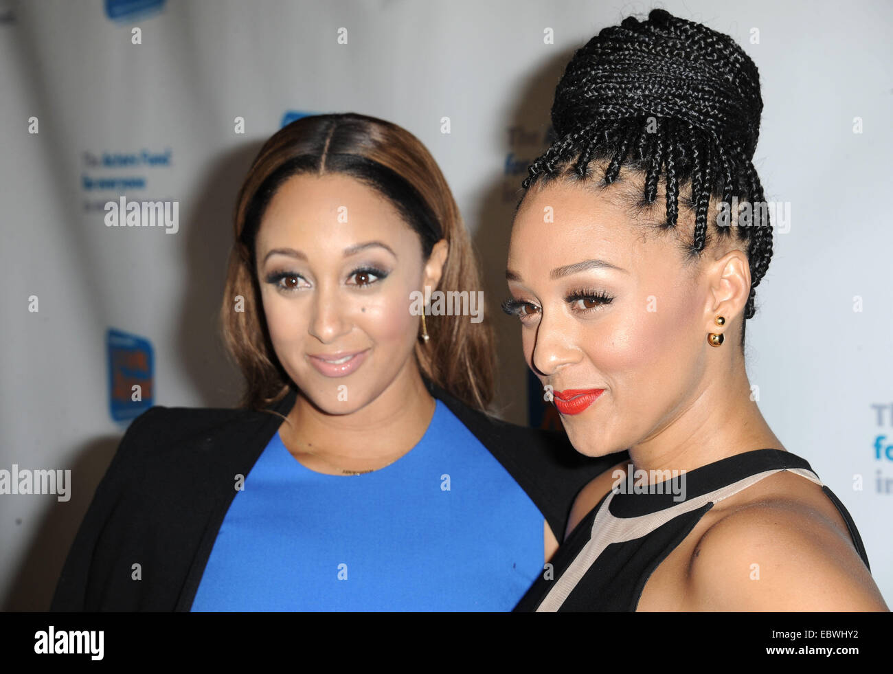 Los Angeles, California, USA. 4th Dec, 2014. Tamera Mowry, Tia Mowry