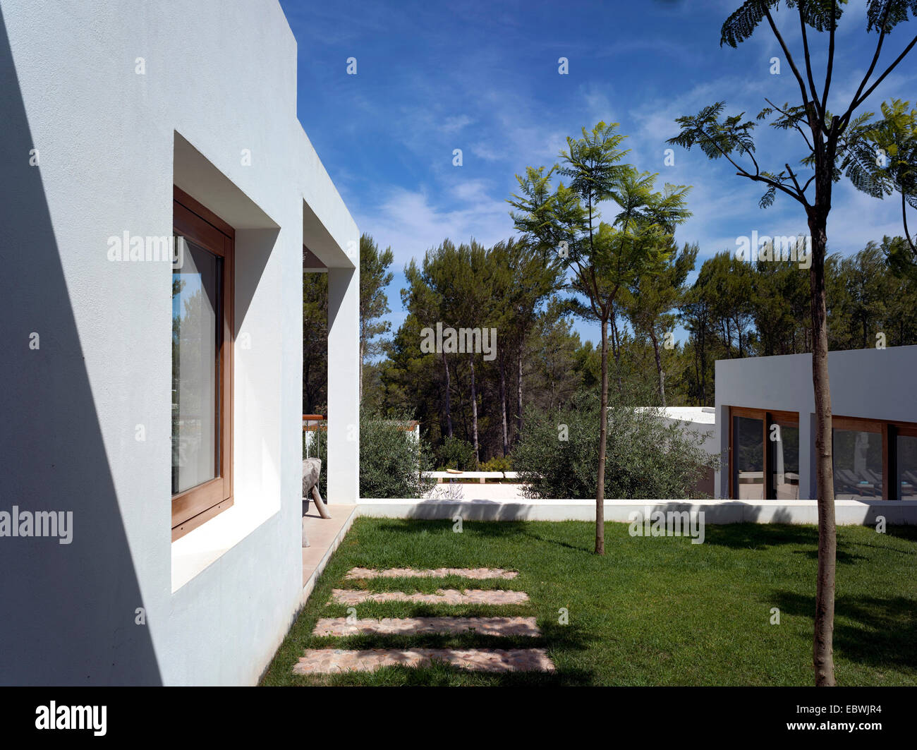 Private House, Morna Valley Ibiza, Spain. Architect: de Blacam & Meagher, 2013. View towards swimming pool from upper garden. Stock Photo