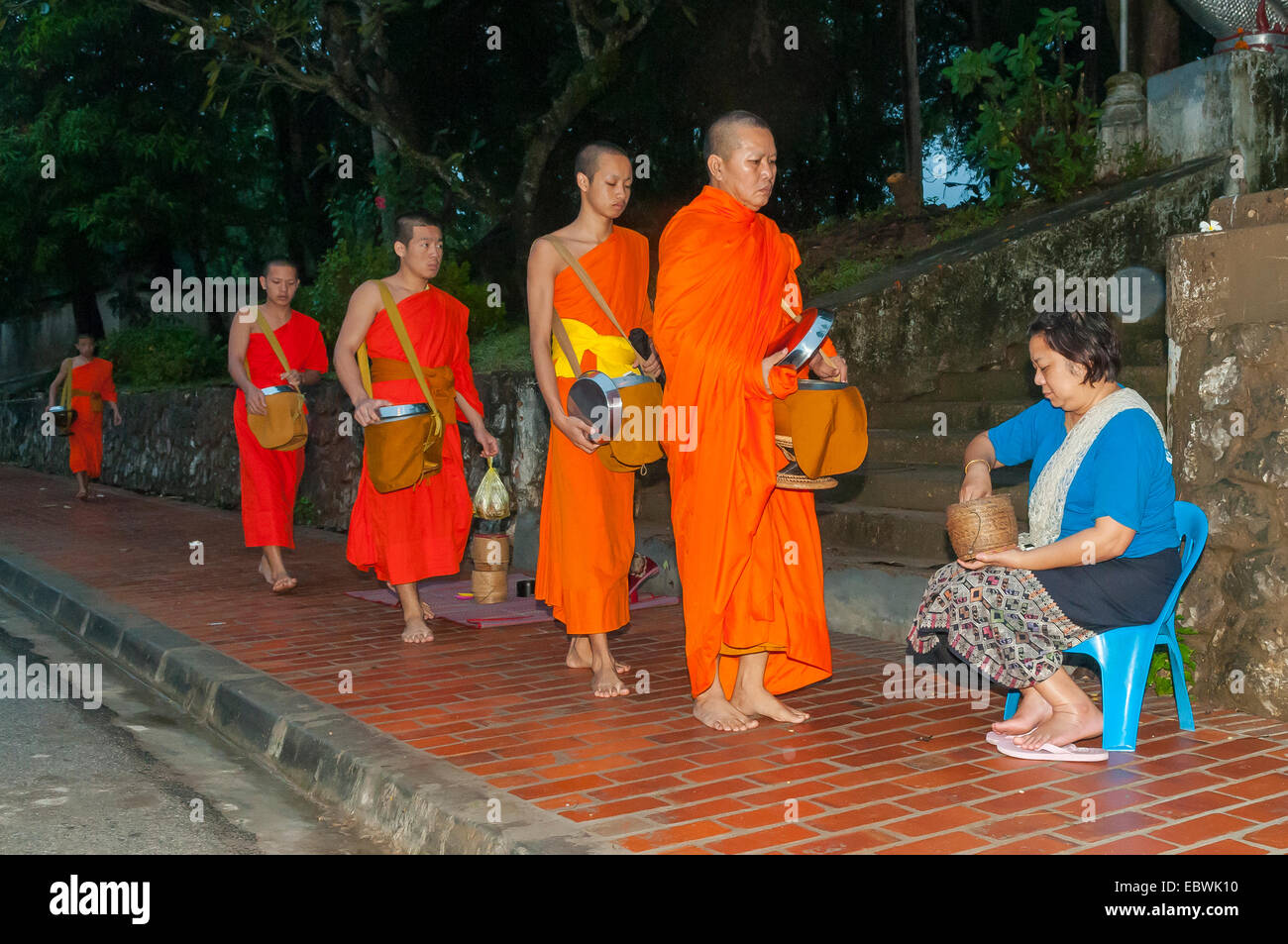 Giving Alms to Monks, Luang Prabang, Laos Stock Photo