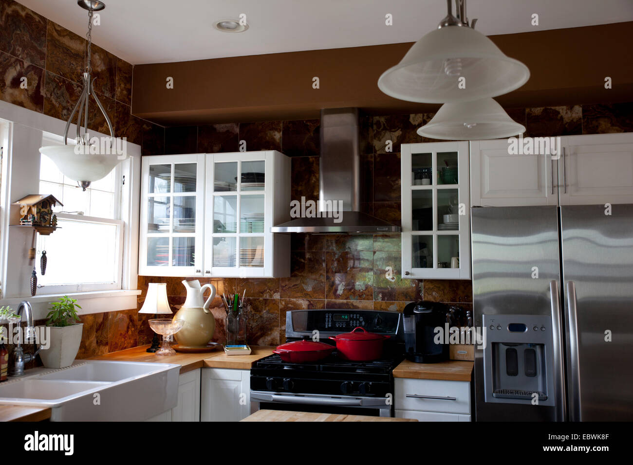 Beautiful kitchen with modern stainless steel appliances Stock Photo