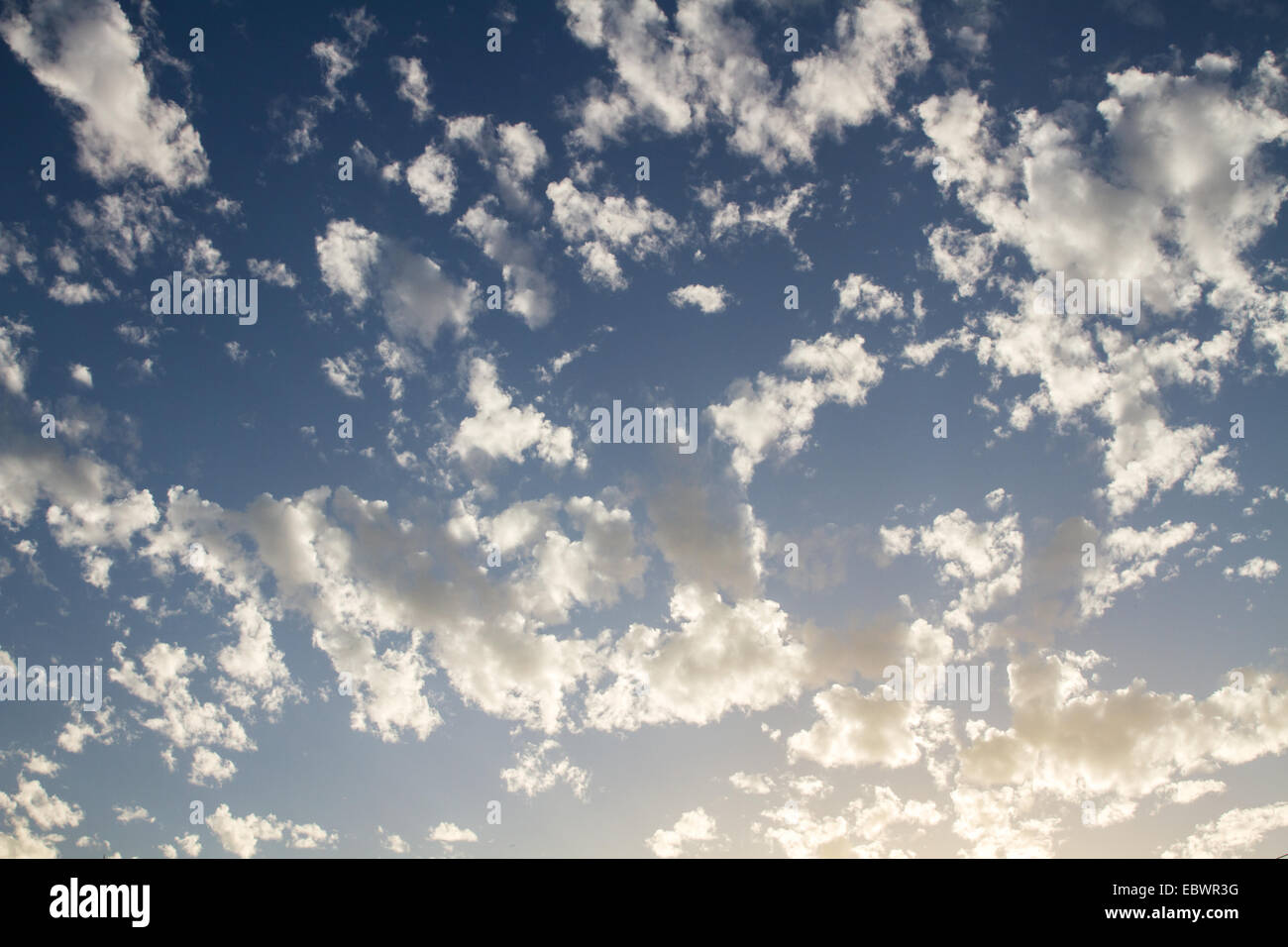 Beautiful white clouds on a blue sky background Stock Photo - Alamy