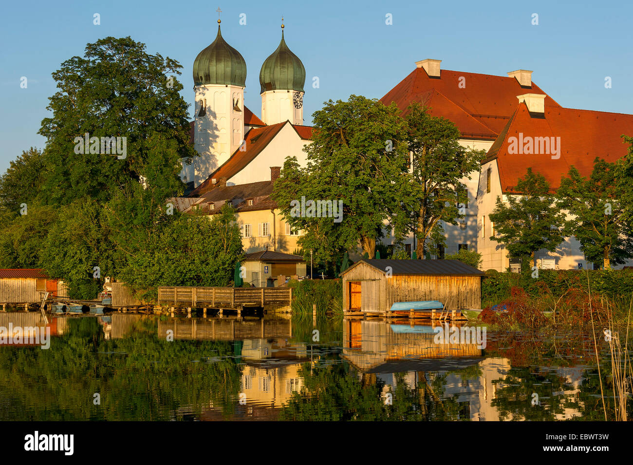 Benedictine Kloster Seeon monastery with monastery church of St. Lambert, Klostersee, Seebruck, Chiemgau, Upper Bavaria, Bavaria Stock Photo