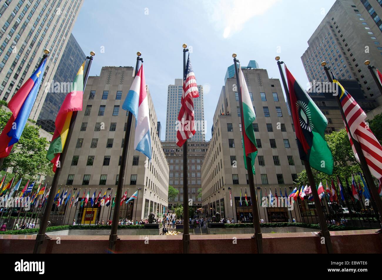 Multinational flags flying near Rockerfellar Centre in New York City Stock Photo