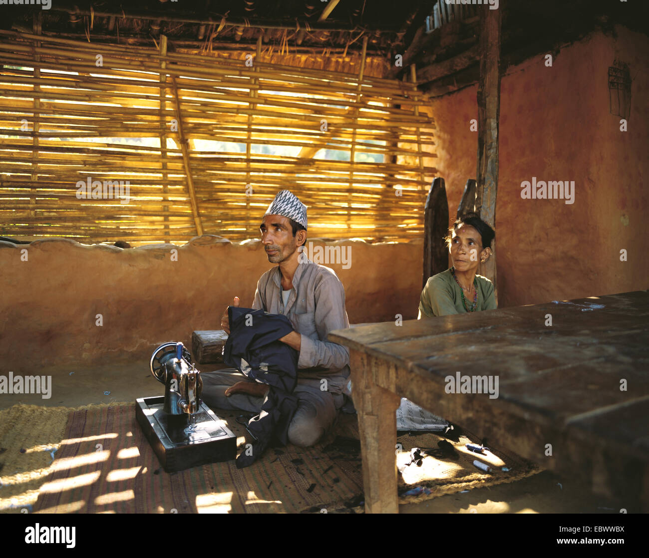 village tailor and his wife, Nepal, Sultibari Stock Photo