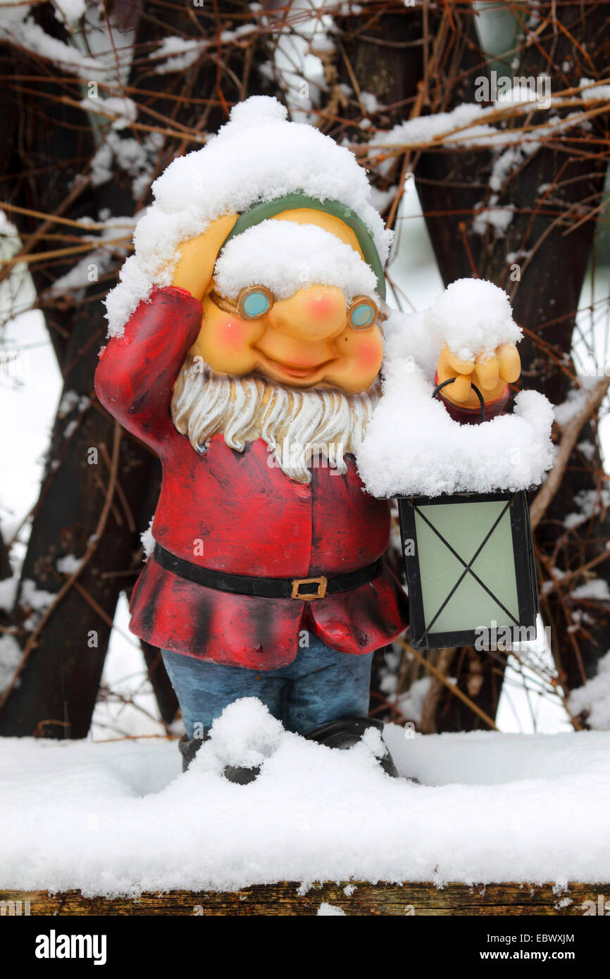 garden gnome in winter Stock Photo