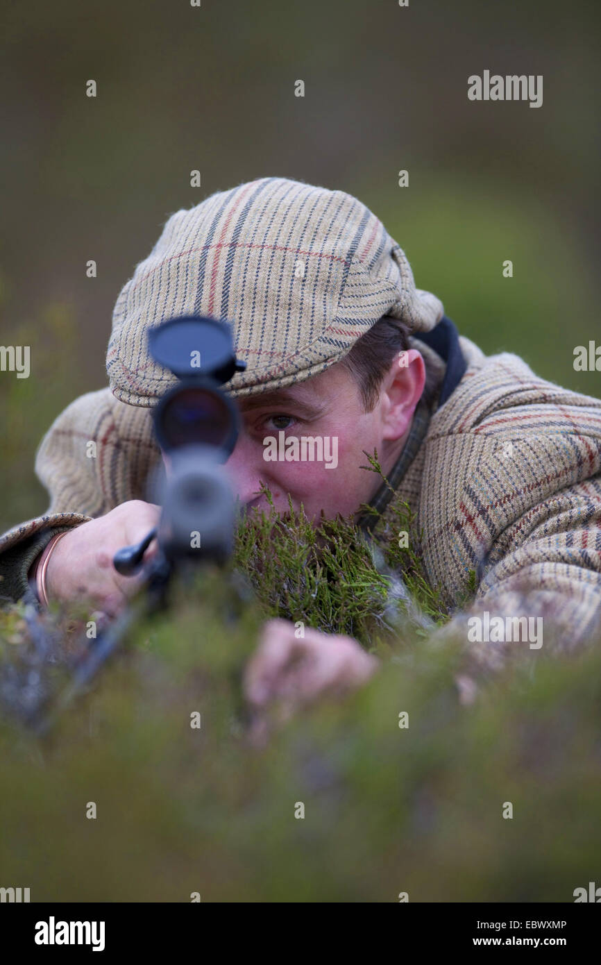 hunter target with his hunting rifle, United Kingdom, Scotland