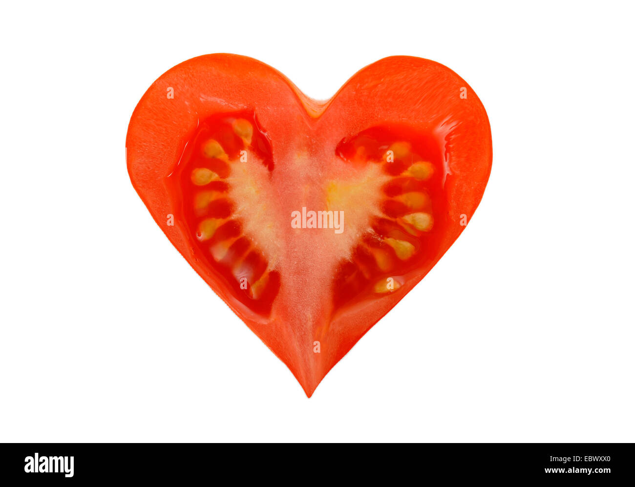 cut heart-shaped tomato Stock Photo