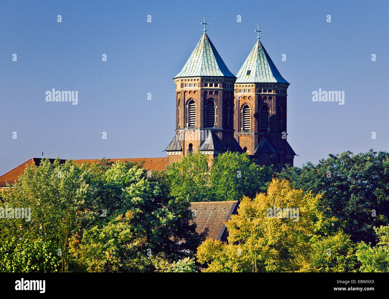 steeples of catholic church Sr mariae Himmelfahrt in Altendorf, Germany, North Rhine-Westphalia, Ruhr Area, Essen Stock Photo