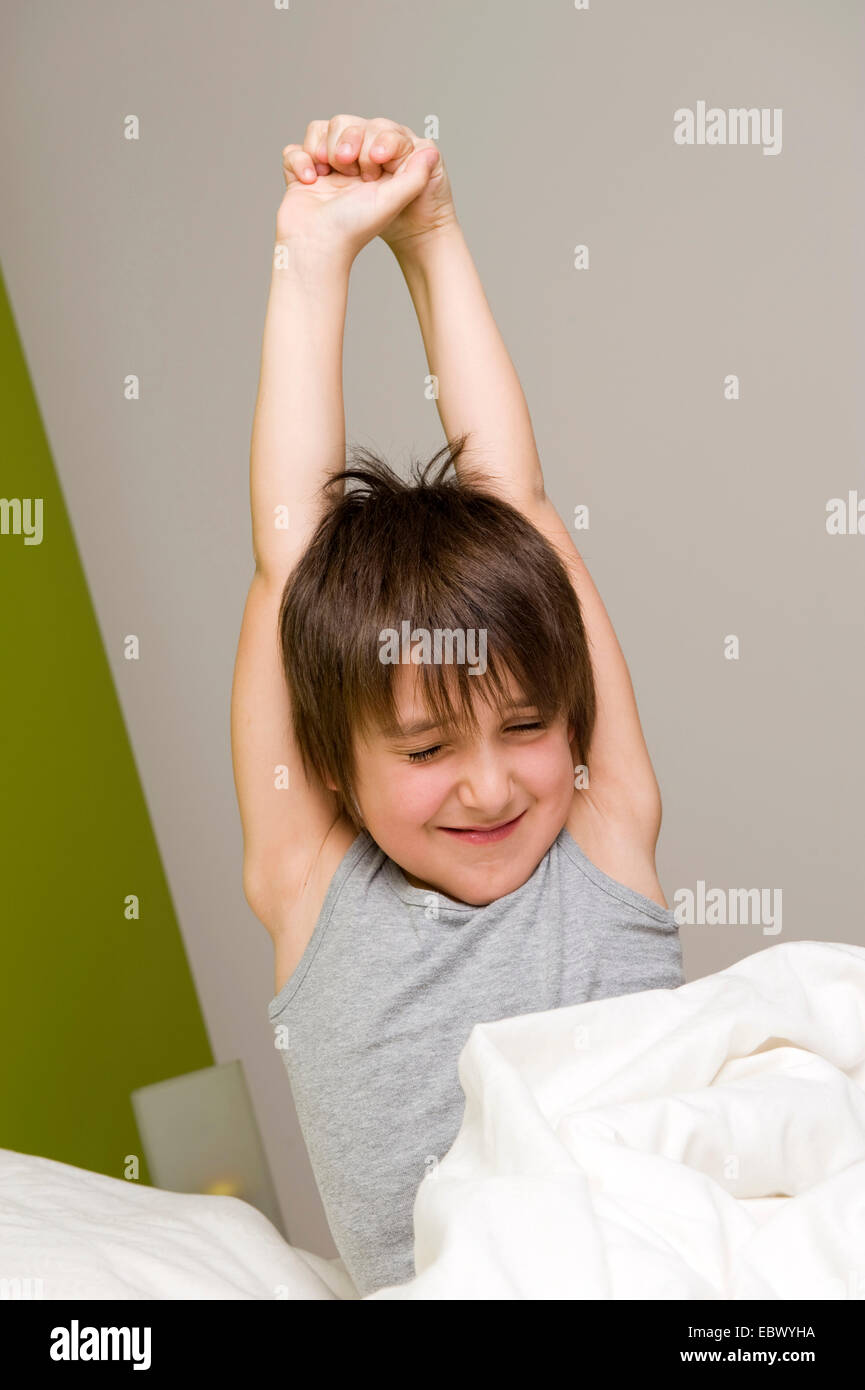 little boy wakes up in the morning Stock Photo