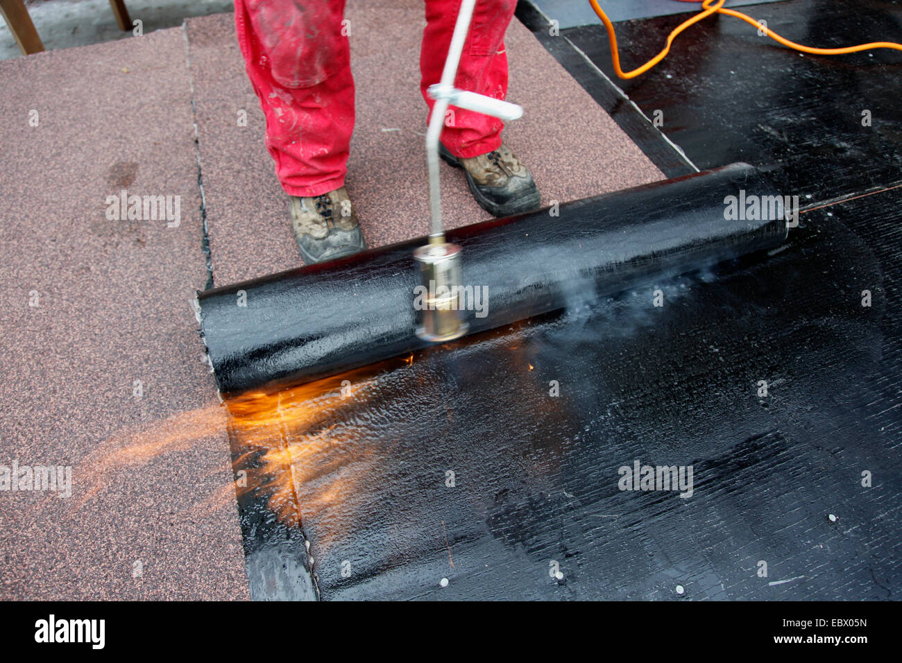 laying on tar paper Stock Photo Alamy