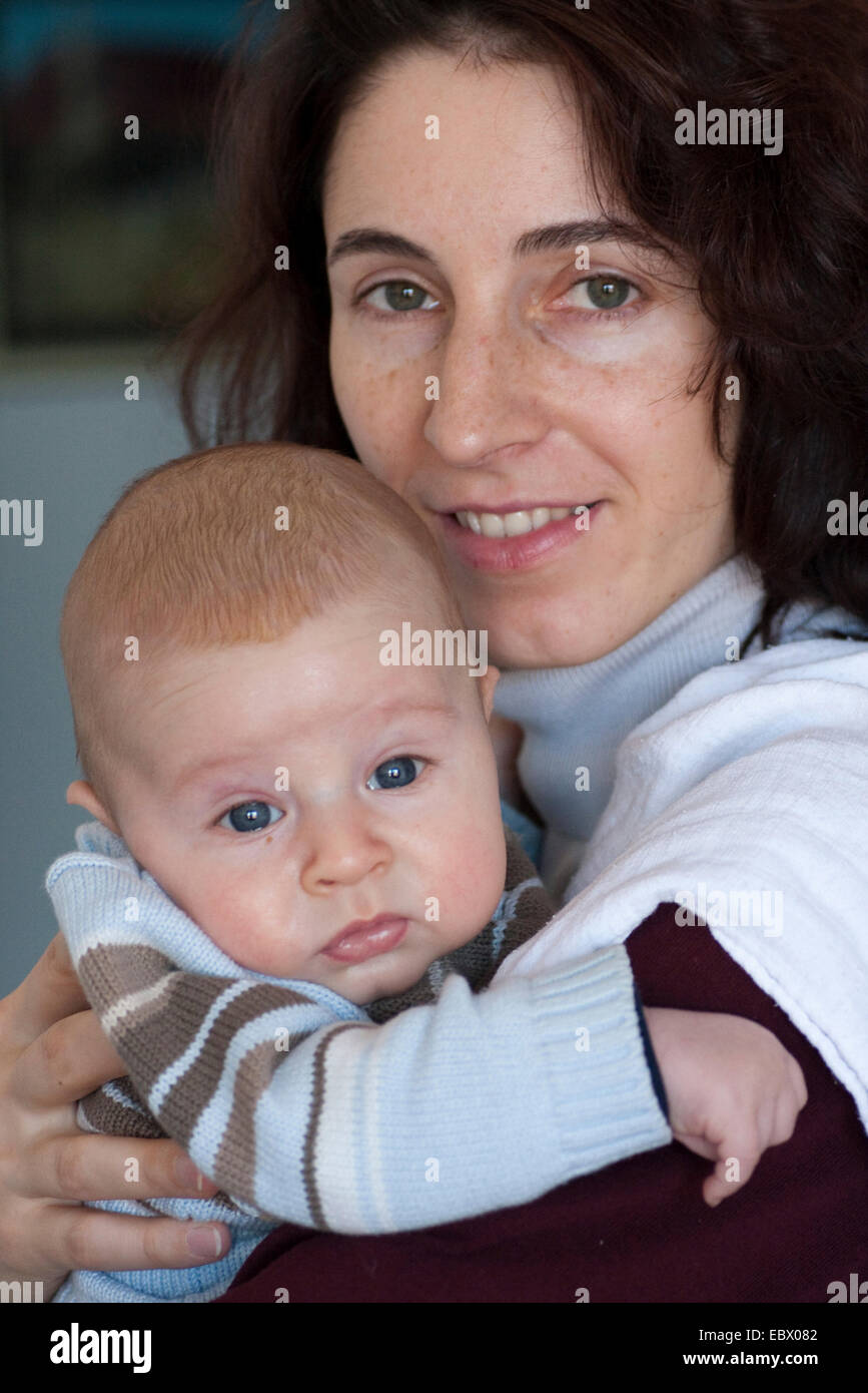 mother with baby in her arms Stock Photo