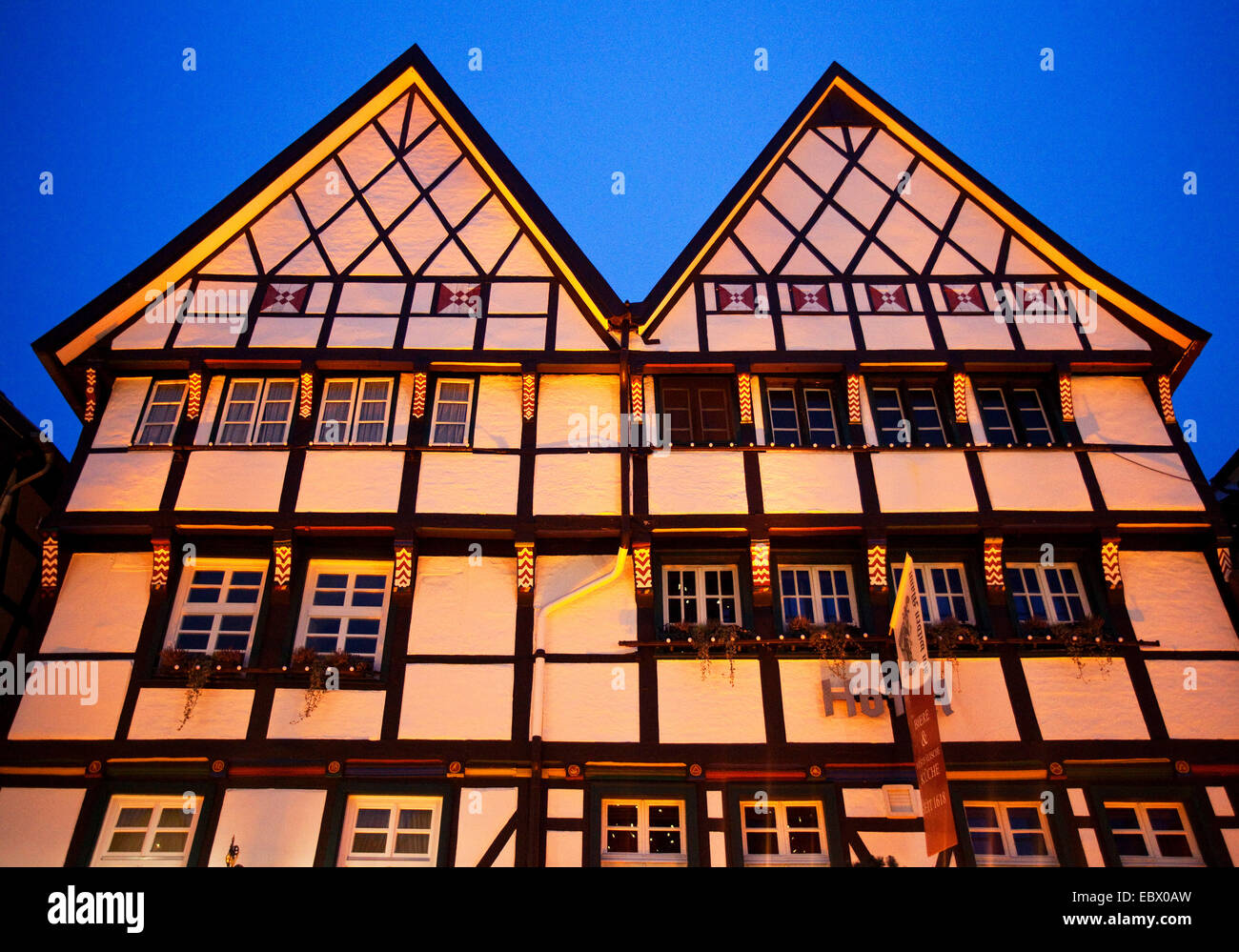 two timbered houses in the old town of Soest at dusk, Germany, North