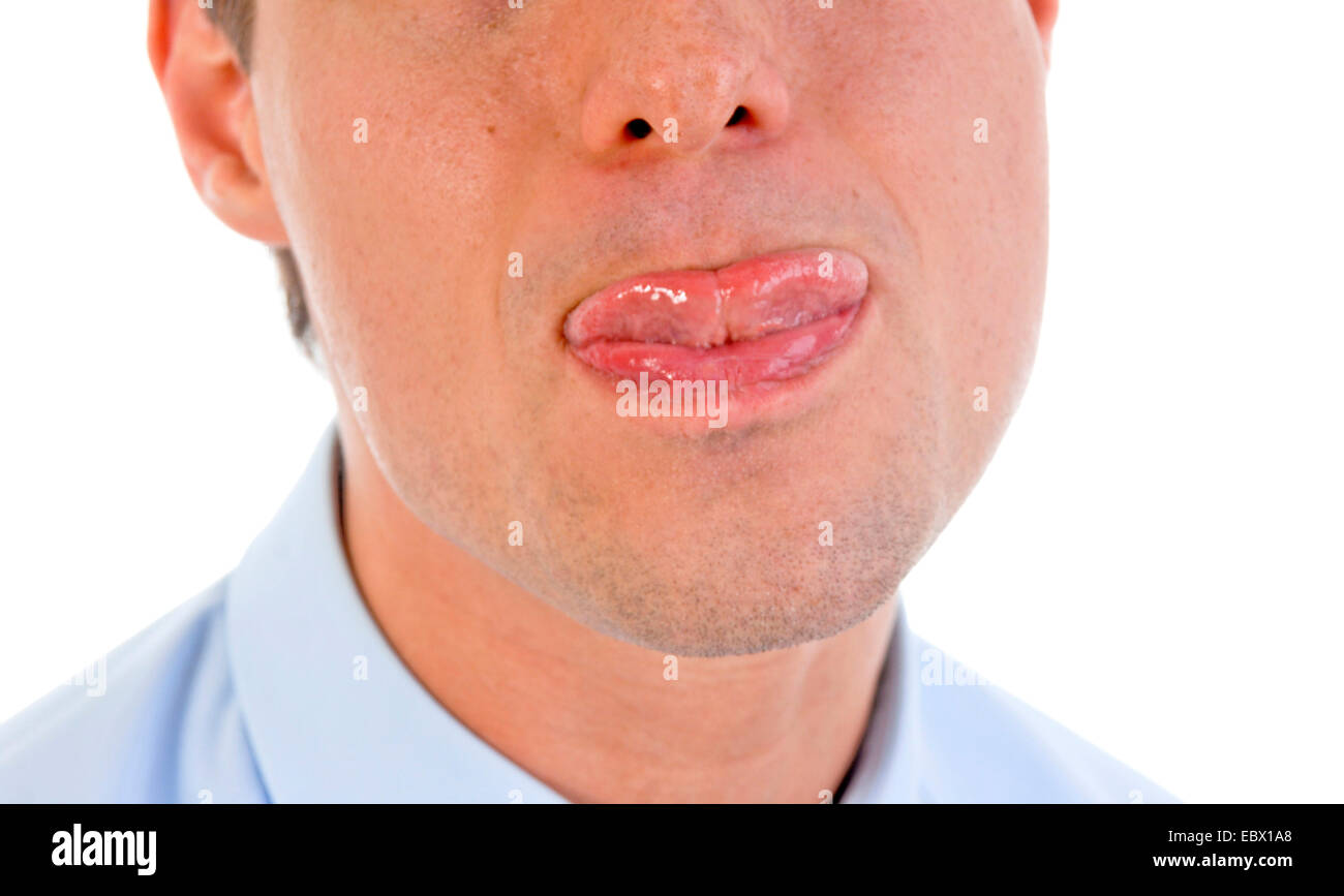 young man sticking tongue out Stock Photo
