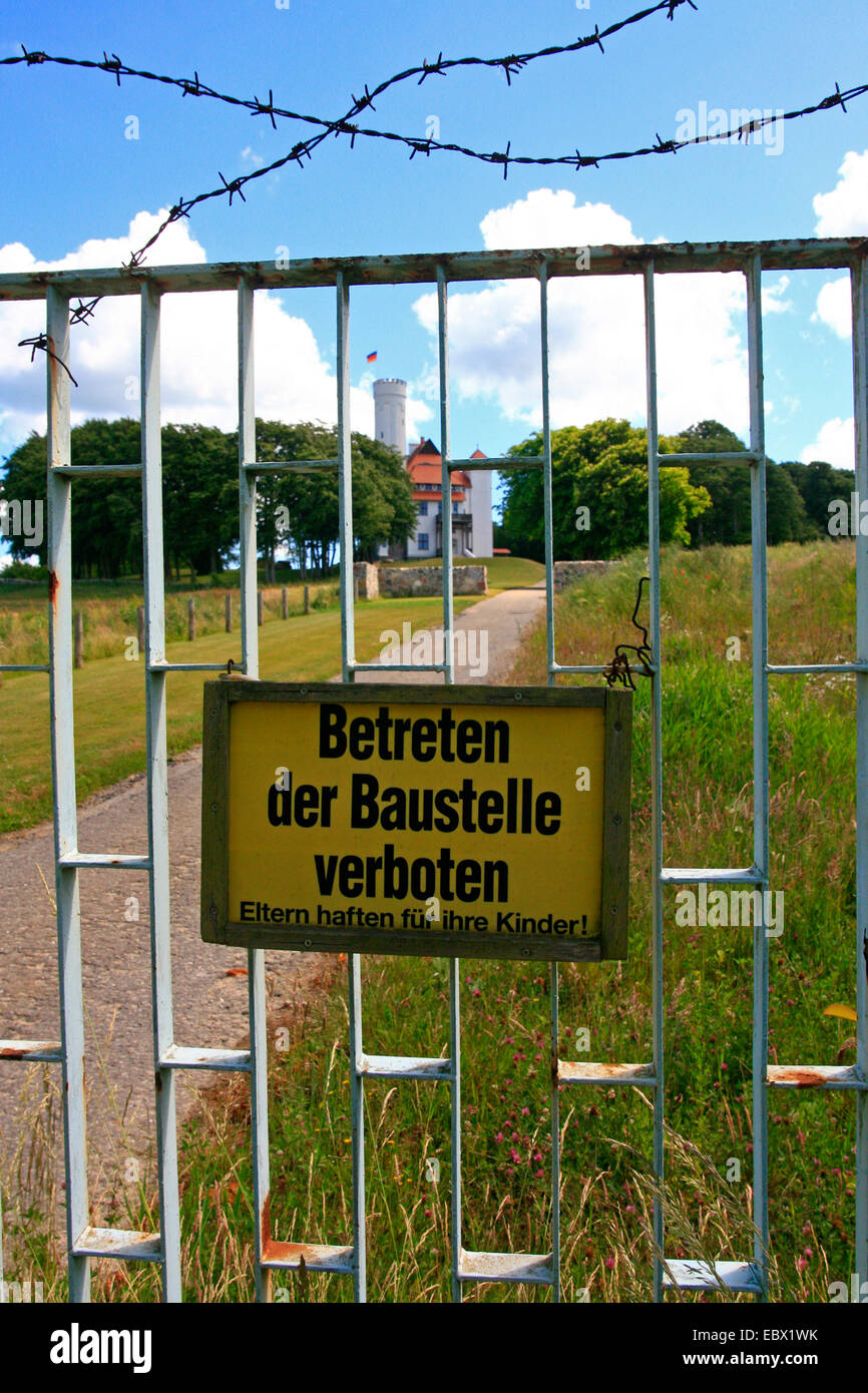 construction sign at fence Stock Photo Alamy