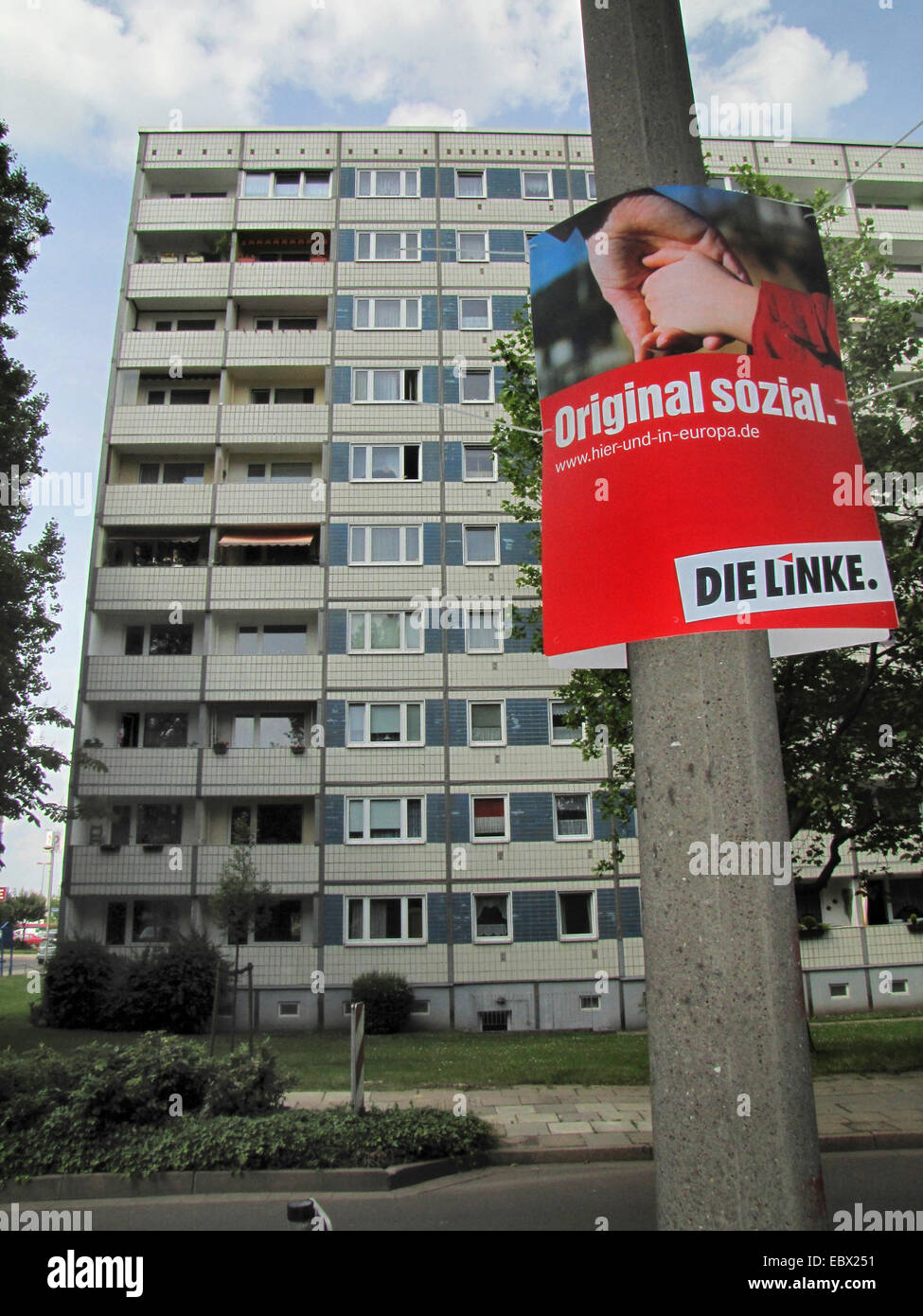 housing estate in former East Germany, socialist buildings, election poster of the left-wing party 'Die Linke' at a lantern post, Germany, Mecklenburg-Western Pomerania, Magdeburg Stock Photo