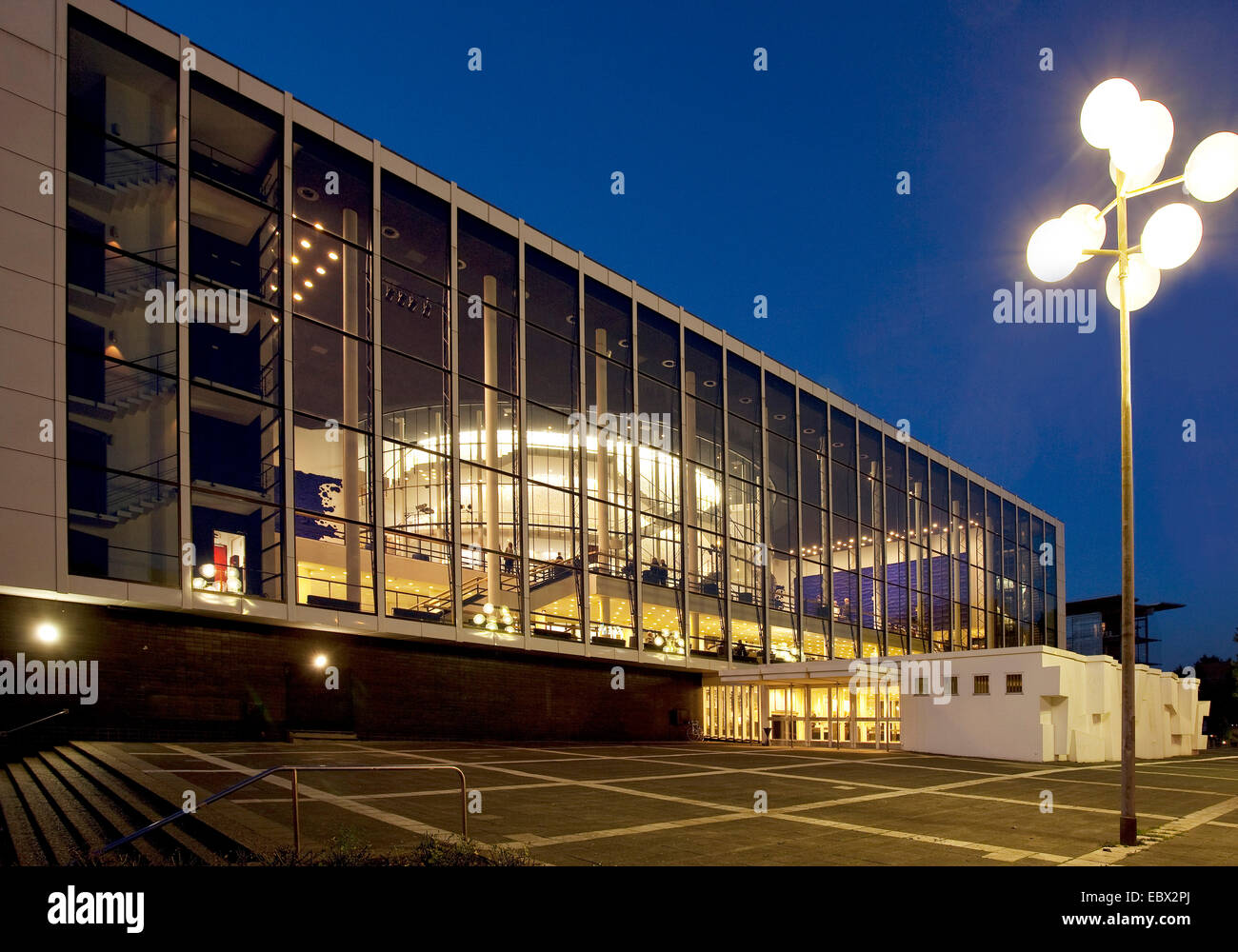 illuminated 'Musiktheater im Revier' at blue hour, Germany, North Rhine-Westphalia, Ruhr Area, Gelsenkirchen Stock Photo