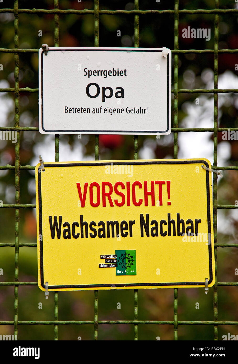 signs 'Sperrgebiet Opa' and 'Vorsicht wachsamer Nachbar' at an allotment garden in Wetter, Germany, North Rhine-Westphalia, Ruhr Area, Wetter/Ruhr Stock Photo