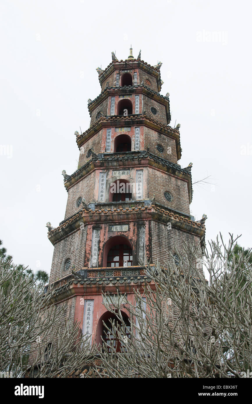 Phuoc Dien Tower in front of the Thien Mu Pagoda in Hue Vietnam situated on the bank of the Perfume River Stock Photo