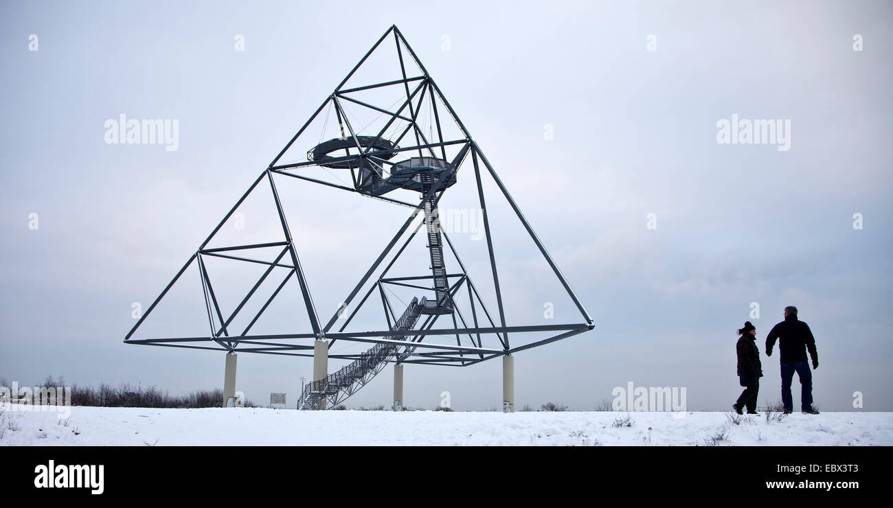 two people at the Tetraeder in winter, Germany, North Rhine-Westphalia, Bottrop Stock Photo