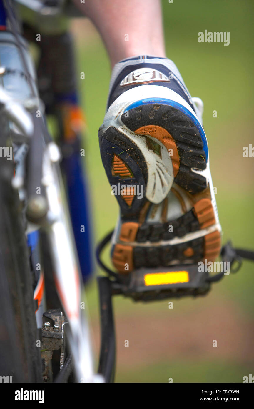 close up of a foot of a cyclist on mountain bike pedal, United Kingdom, Scotland Stock Photo