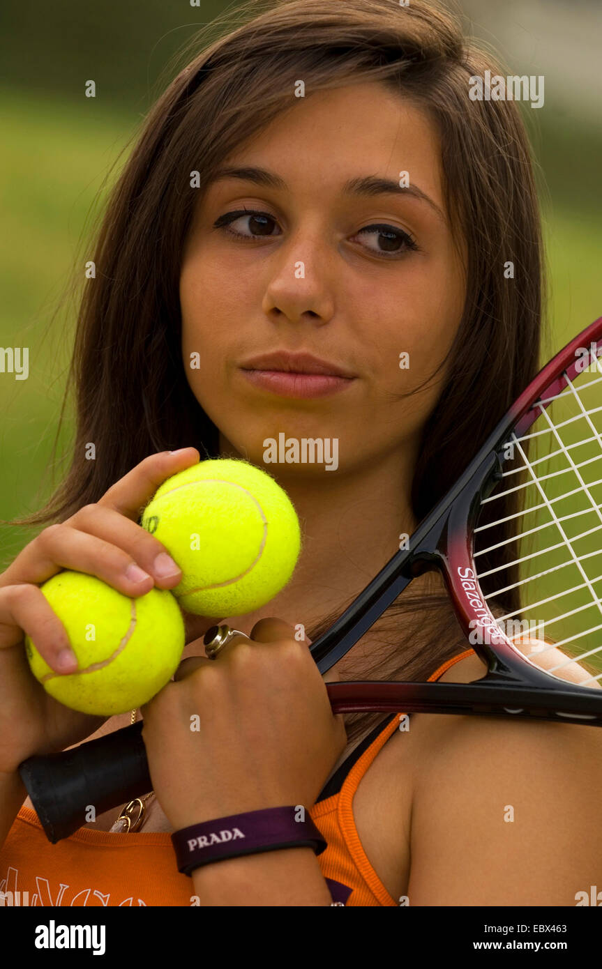 teen with racket an tennis balls Stock Photo Alamy