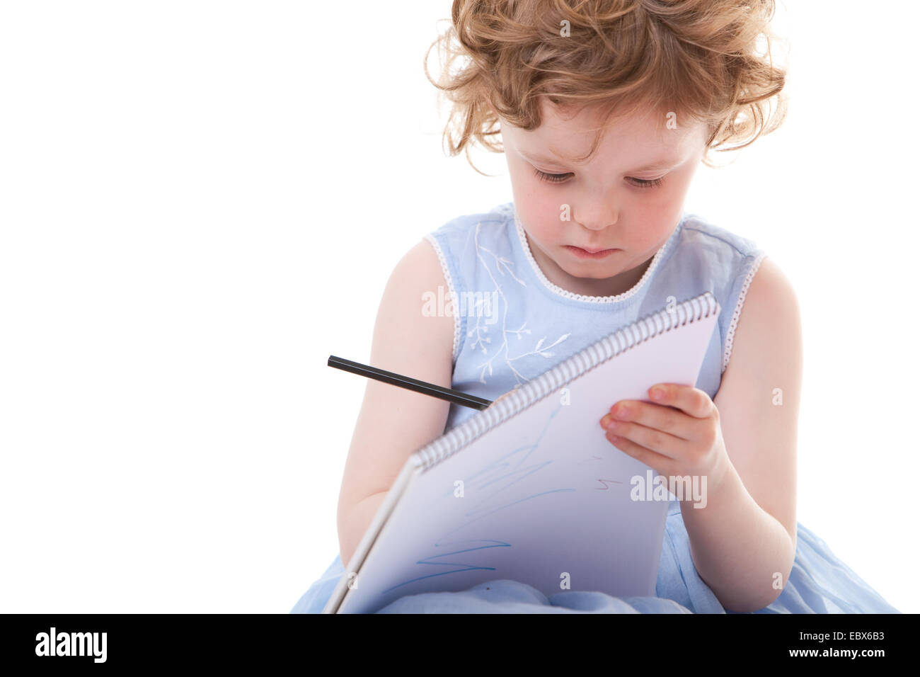 Little girl drawing with pencils Stock Photo - Alamy