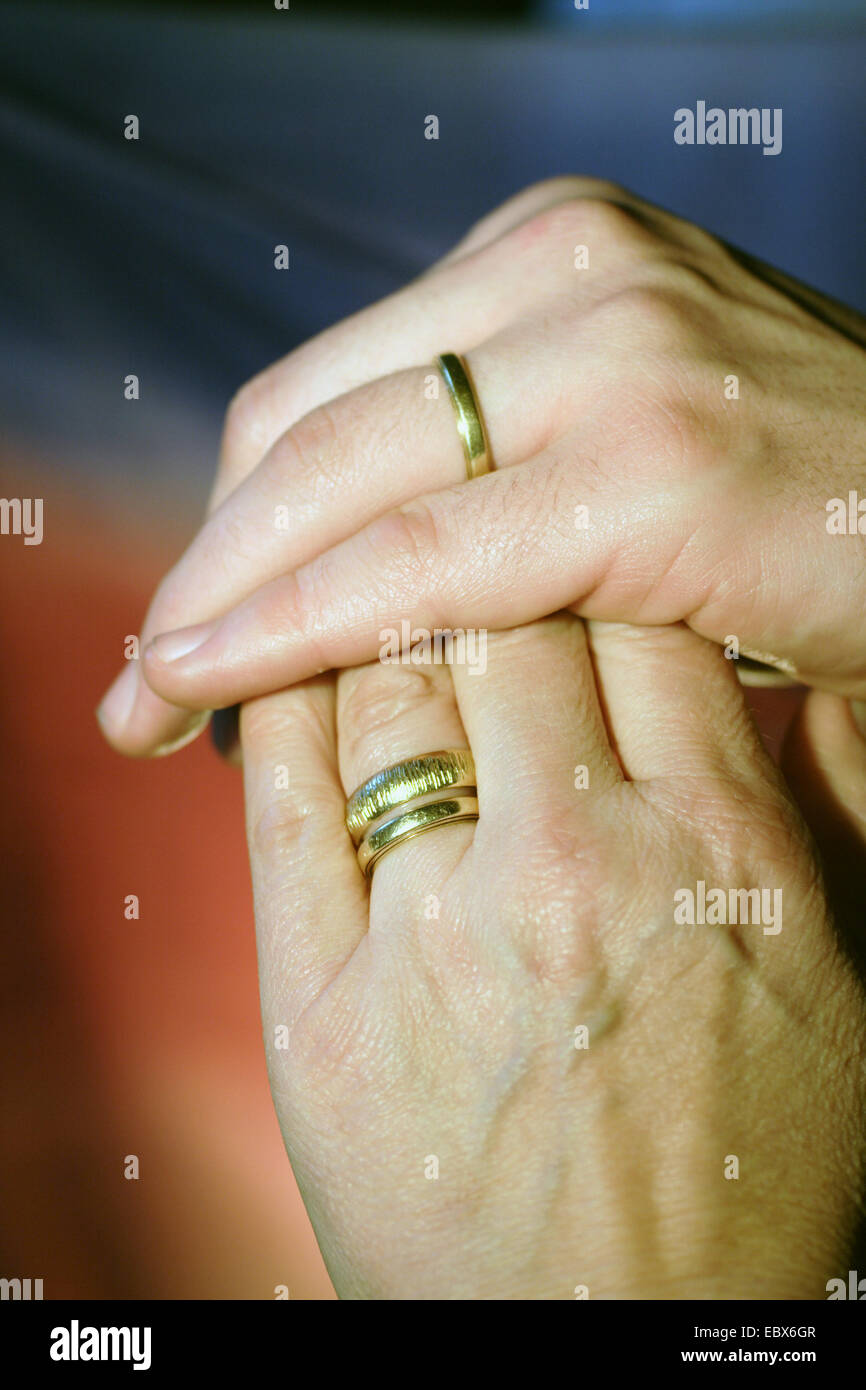 hands with marriage rings Stock Photo Alamy