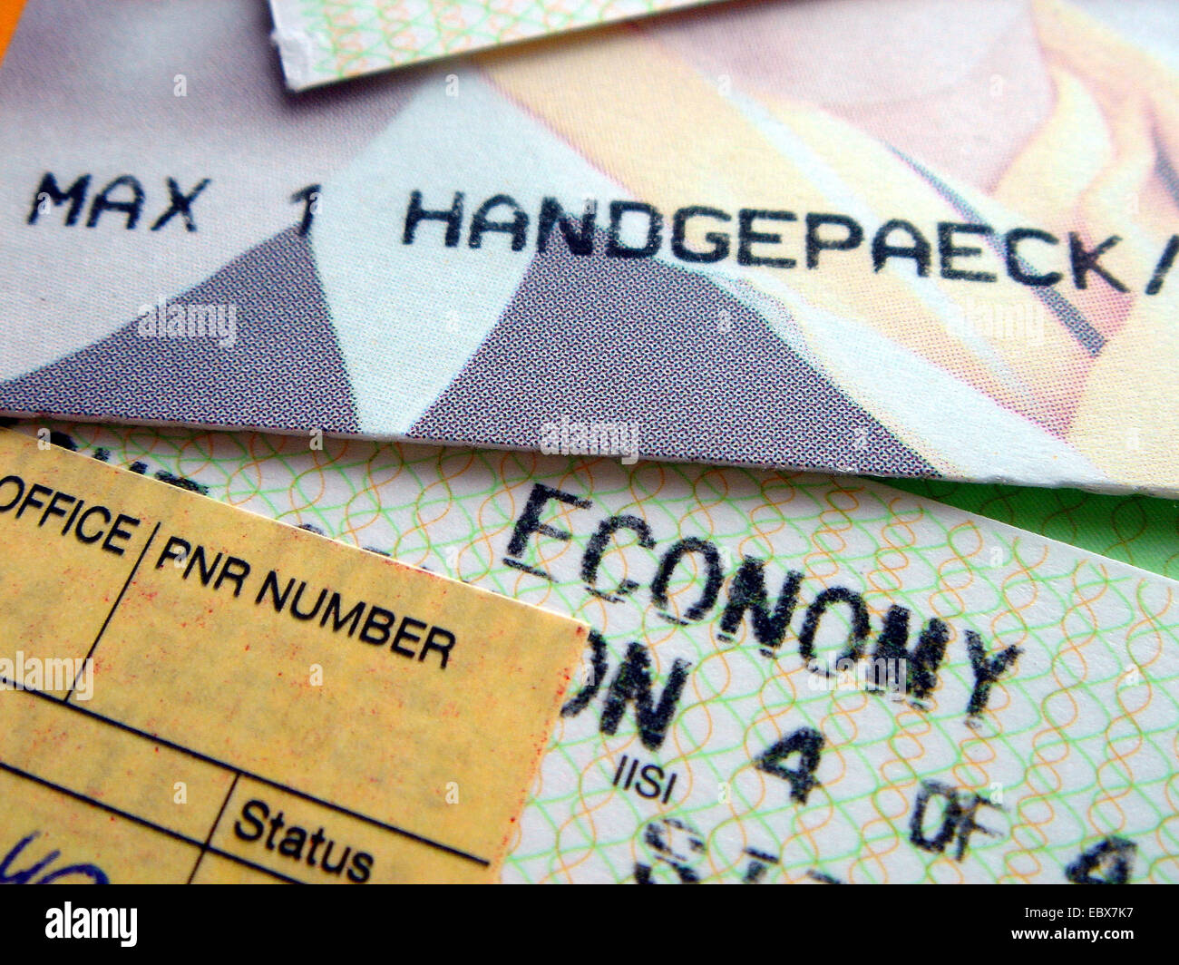flight ticket with information: only one piece hand baggage in tourist class Stock Photo