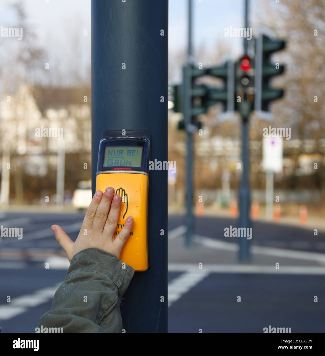 hand pressing sensor of pedestrian light Stock Photo - Alamy