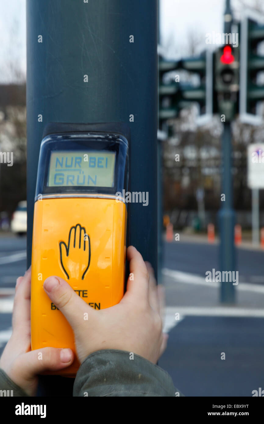 hand pressing sensor of pedestrian light Stock Photo - Alamy